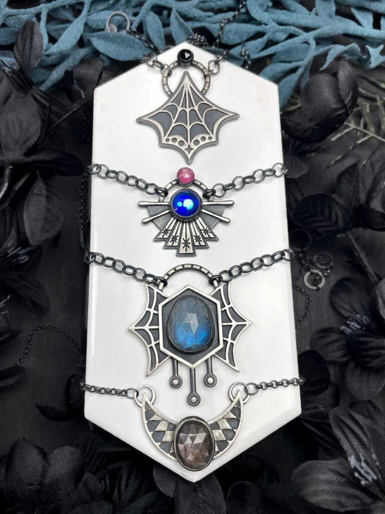 hypnovamp shadowy atomic jewelry display haunted happenings marketplace salem ma featured 1 768x1024