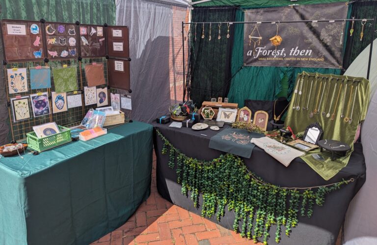 a forest then booth display haunted happenings marketplace salem ma 1 scaled 1 768x500