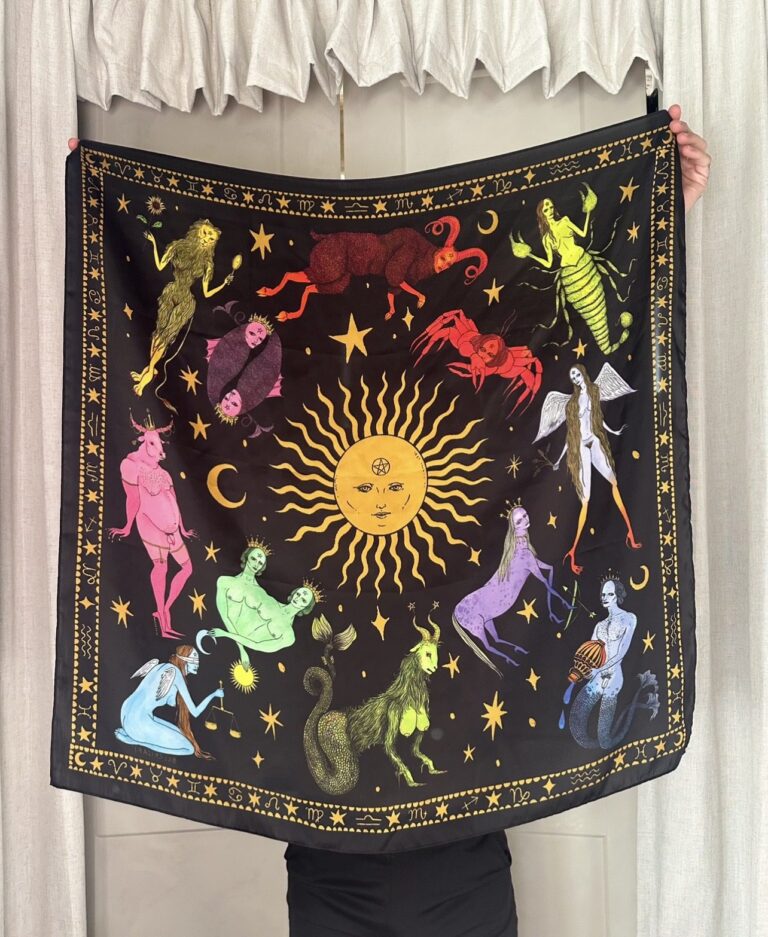 Black scarf with multicolored zodiac figures around a yellow sun