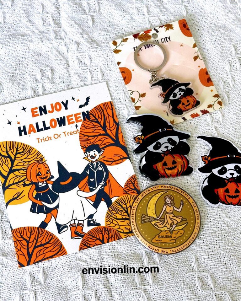 Illustrated Halloween card, panda pumpkin keychains and round Salem design by Envision Creative LLC