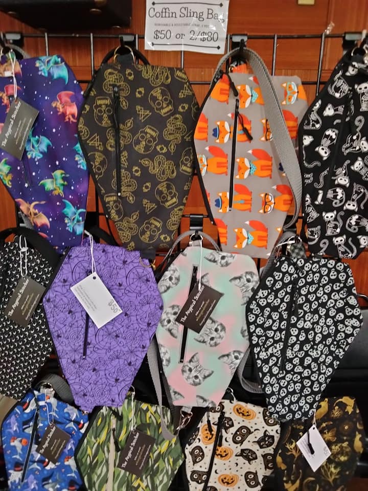 Coffin-shaped sling bags in skull, bat, cat and colorful patterned fabrics by The Atypical Stitcher