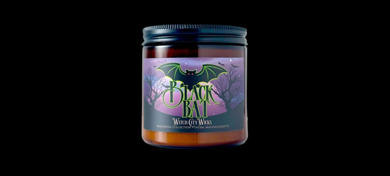 Witch City Wicks Black Bat candle in an amber jar