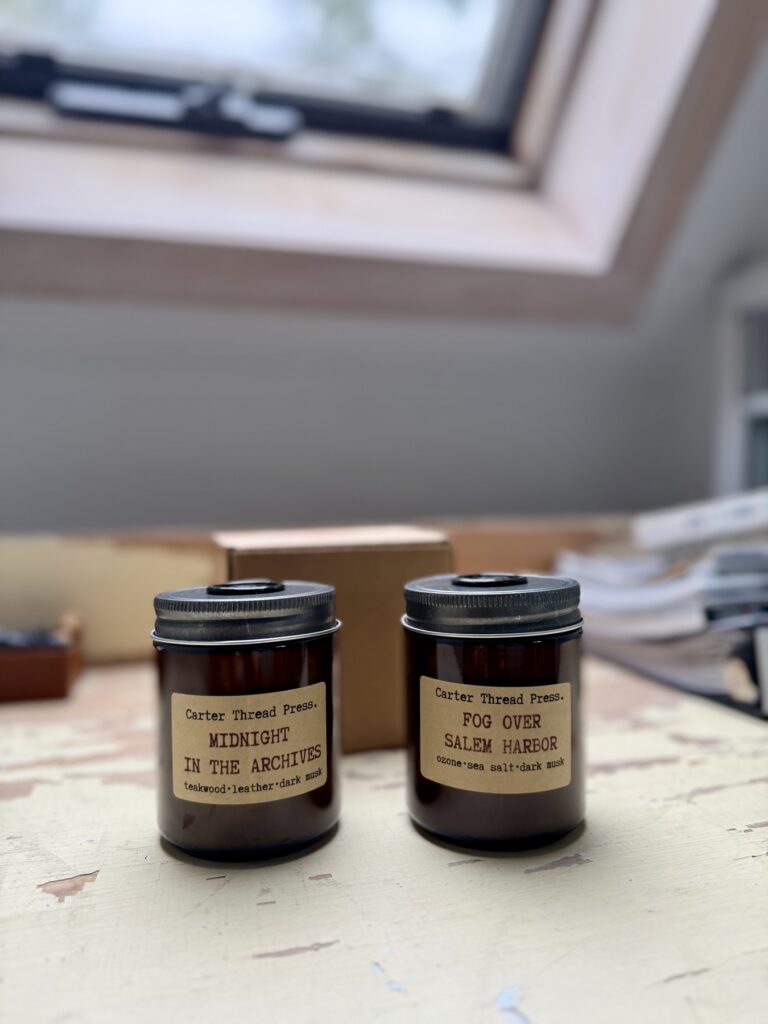 Carter Thread Press candles labeled Midnight in the Archives and Fog Over Salem Harbor. Carter Thread Press candles labeled Midnight in the Archives and Fog Over Salem Harbor.